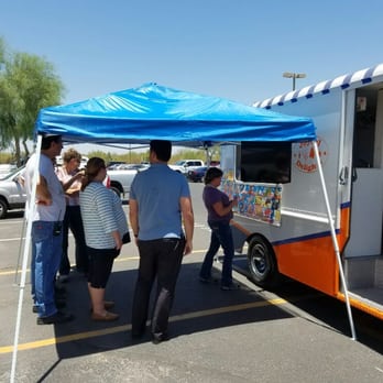 Joyful Delights - a group of people standing in front of a food truck - Food Trucks Near Me Joyful Delights - a group of people standing in front of a food truck - Food Trucks Near Me