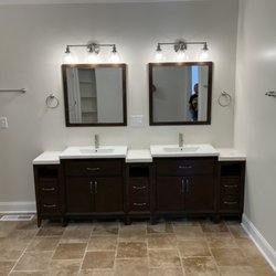 J Henry Construction - New vanity and mirrors installed, new lighting throughout
