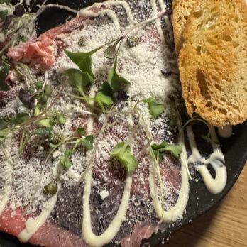Manzzo Cuisine - Carpaccio appetizer - Italian Near Me - Windermere, Florida Manzzo Cuisine - Carpaccio appetizer - Italian Near Me - Windermere, Florida