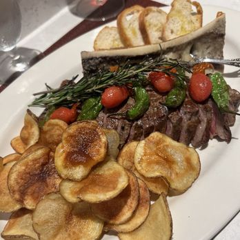 OTRA Restaurant - Steak w/bone marrow, shishito peppers, tomatoes & potato crisps - delicious!  CARNE a la PLANCHA con "Huesos Huecos" - Tapas/Small Plates Near Me - Providence, Rhode Island