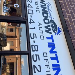 Out front of shop