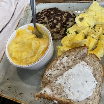 First Watch - Chicken sausage with grain toast, cheesy grits and eggs - Breakfast & Brunch Near Me - Fort Worth, Texas First Watch - Chicken sausage with grain toast, cheesy grits and eggs - Breakfast & Brunch Near Me - Fort Worth, Texas