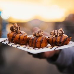Donut I Love U - Are You Snickering - Chopped Snickers chocolate bar, Ghirardelli® Chocolate Sauce, Ghirardelli® Caramel Sauce.