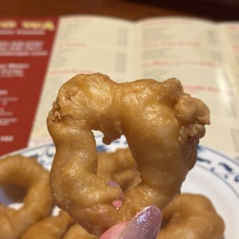 Big Wa Chinese Cuisine - a hand holding a donut - Chinese Near Me - Tempe, Arizona