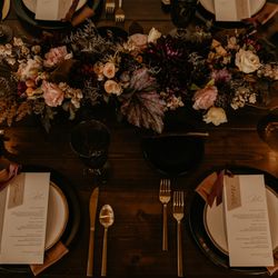 Moody winter wedding tablescape by Blooms and Twine Floral Design.