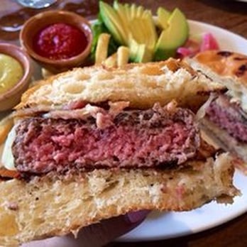 Nopa - Wood Grilled Hamburger, Pickled Onions, Gruyere, and Bacon w/ French Fries - New American Near Me - San Francisco, California Nopa - Wood Grilled Hamburger, Pickled Onions, Gruyere, and Bacon w/ French Fries - New American Near Me - San Francisco, California