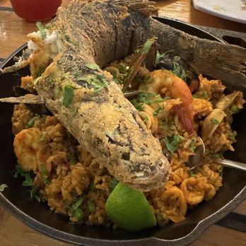 El Mono - Paella with whole fried fish - Peruvian Near Me - Berkeley, California