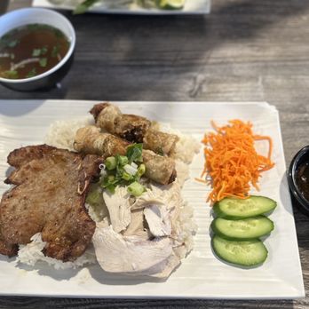 Pho 101 - Rice dish with pork chop, boiled chicken and egg roll. - Vietnamese Near Me - Westminster, California Pho 101 - Rice dish with pork chop, boiled chicken and egg roll. - Vietnamese Near Me - Westminster, California