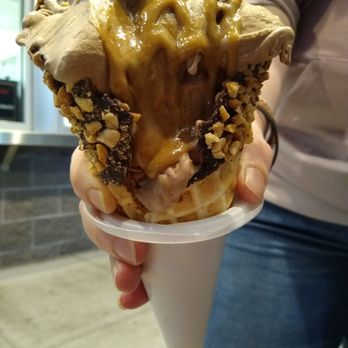 Bell's Delites - a person holding a cup of ice cream - Ice Cream & Frozen Yogurt Near Me - Parkesburg, Pennsylvania Bell's Delites - a person holding a cup of ice cream - Ice Cream & Frozen Yogurt Near Me - Parkesburg, Pennsylvania