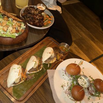 Myth Restaurant & Lounge - Guava BBQ wings, Caesar salad, lamb sliders, and oxtail bao buns. - Lounges Near Me - Brooklyn, New York
