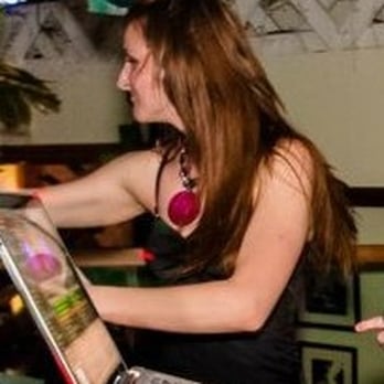Addendum Salon - After: Long brown hair (Facing sideways with arms in awkward half dance position) - Hair Extensions Near Me - San Diego, California Addendum Salon - After: Long brown hair (Facing sideways with arms in awkward half dance position) - Hair Extensions Near Me - San Diego, California