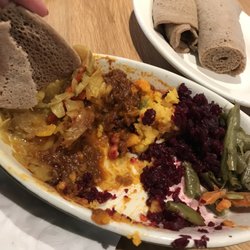 Sampler with injera