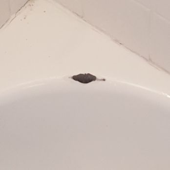 Discovery Coatings - Before:  Chipped porcelain; aged and dingy white color. - Refinishing Services Near Me