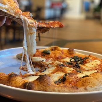 Fratelli - So cheesy! Quattro Formaggi Mozzarella, parmesan, & gorgonzola cheeses; San Marzano tomato sauce - Italian Near Me - Sandy, Utah