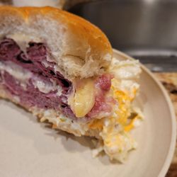 Meacham Deli - The Grandslam Pastrami, corn beef, melted Swiss, coleslaw, and Thousand Island dressing.