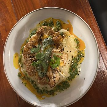 Terrestre Cocina Compasión - Coliflower steak on a mound of bread plant mash with chimichurri sauce - Salad Near Me - San Juan, Puerto Rico