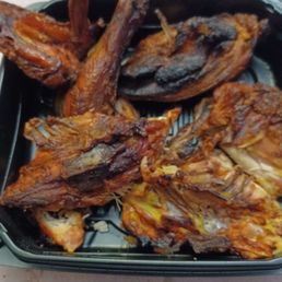 Burnt chicken that was so dry it looked like leather. Yes, that's a feather on the burned wing... Burnt chicken that was so dry it looked like leather. Yes, that's a feather on the burned wing...