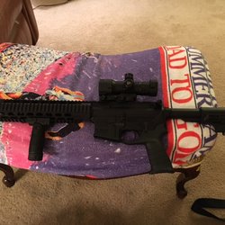 Dixie Gun House - Mossberg AR-15 with optic, handle, and strap