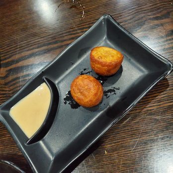 Suki Hanna - Octopus dumplings - Sushi Bars Near Me - Orlando, Florida Suki Hanna - Octopus dumplings - Sushi Bars Near Me - Orlando, Florida