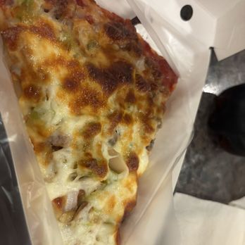 Beggars Pizza - Slice of sausage and vegetable pizza - Pizza Near Me - Chicago, Illinois Beggars Pizza - Slice of sausage and vegetable pizza - Pizza Near Me - Chicago, Illinois