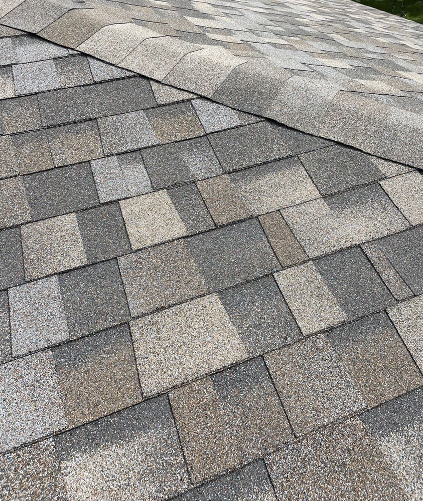 Slide of Astro Roofing