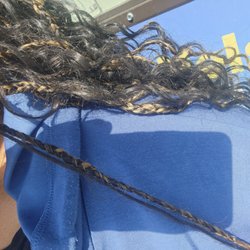 Authentic African Hair Braiding - Those are the end of my braids and that is my shoulder... not mid back.