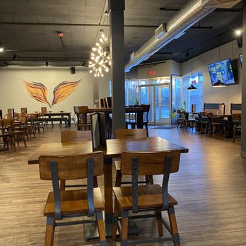 The Valkyrie - a dining area with tables and chairs - Cocktail Bars Near Me - Muskegon, Michigan The Valkyrie - a dining area with tables and chairs - Cocktail Bars Near Me - Muskegon, Michigan