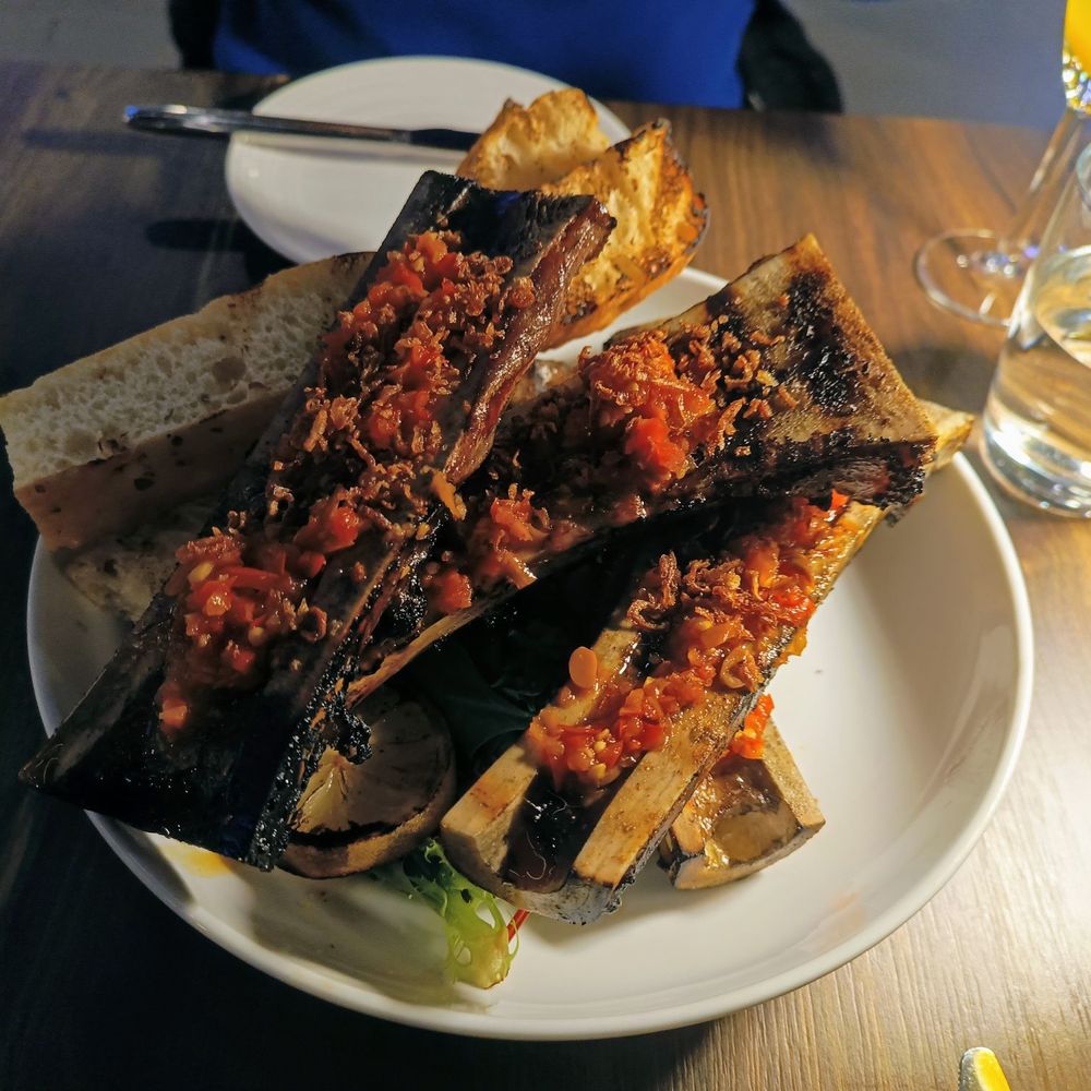 Hestia Kitchen + Bar - Bone marrow with burnt bread - Steakhouses Near Me - Richmond, British Columbia Hestia Kitchen + Bar - Bone marrow with burnt bread - Steakhouses Near Me - Richmond, British Columbia