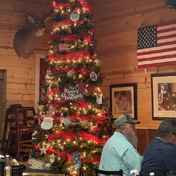 Cajun Claws Seafood Boilers - a christmas tree in a restaurant - Seafood Near Me - Rayne, Louisiana Cajun Claws Seafood Boilers - a christmas tree in a restaurant - Seafood Near Me - Rayne, Louisiana