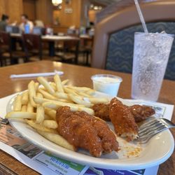 Empire Diner - Boneless buffalo wings with French fries.