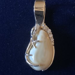The Jeweler's Edge - Ivory, diamonds and 14k gold