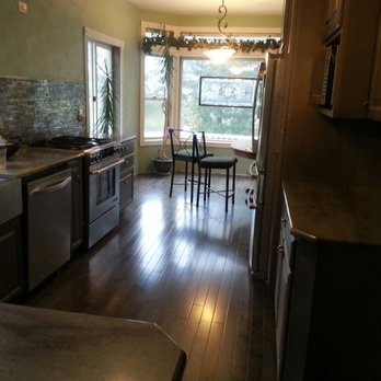 Cravenho Construction & Building - a kitchen and dining room - General Contractors Near Me