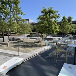 Alexandria Center For Life Science - Outside tables and games