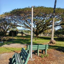 Delapidated underkept benches, paths, lightpoles and landscaping