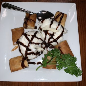 Lamai Ban Thai Kitchen - Fried Bananas drizzled w/chocolate syrup & coconut ice cream. - Thai Near Me - Greensboro, Georgia Lamai Ban Thai Kitchen - Fried Bananas drizzled w/chocolate syrup & coconut ice cream. - Thai Near Me - Greensboro, Georgia