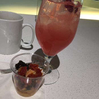 Delta Sky Club - Pink punch and shrimp and grits - Airport Lounges Near Me - Boston, Massachusetts Delta Sky Club - Pink punch and shrimp and grits - Airport Lounges Near Me - Boston, Massachusetts