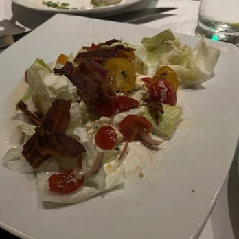 Eddie V's Prime Seafood - 1/2 Iceberg Wedge BLT, it was split for us. The bacon and dressing were amazing. - Seafood Near Me - Plano, Texas Eddie V's Prime Seafood - 1/2 Iceberg Wedge BLT, it was split for us. The bacon and dressing were amazing. - Seafood Near Me - Plano, Texas