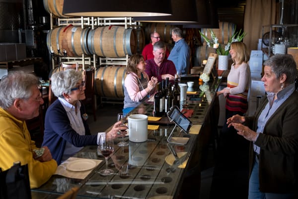 Photo of Distefano Winery - Woodinville, WA, US. a group of people tasting wine