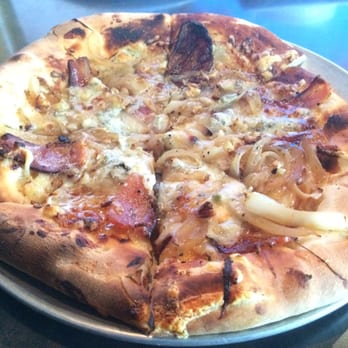 The Ridge Grill - The Figgy Piggy pizza - fig paste, fontina and blue cheese, bacon, caramelized onions, garlic and pepper - Pizza Near Me - Beaverton, Oregon The Ridge Grill - The Figgy Piggy pizza - fig paste, fontina and blue cheese, bacon, caramelized onions, garlic and pepper - Pizza Near Me - Beaverton, Oregon