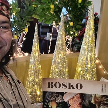 Bosko - a man wearing a hat and holding a book - Seafood Near Me - Helendale, California