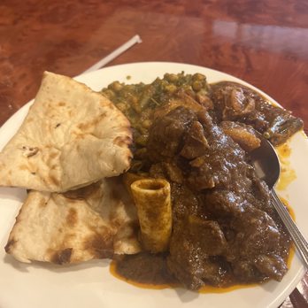 Spicy Mint Albany - Curry goat, Chicken Curry, chana, and Plain Naan - Indian Near Me - Albany, New York Spicy Mint Albany - Curry goat, Chicken Curry, chana, and Plain Naan - Indian Near Me - Albany, New York