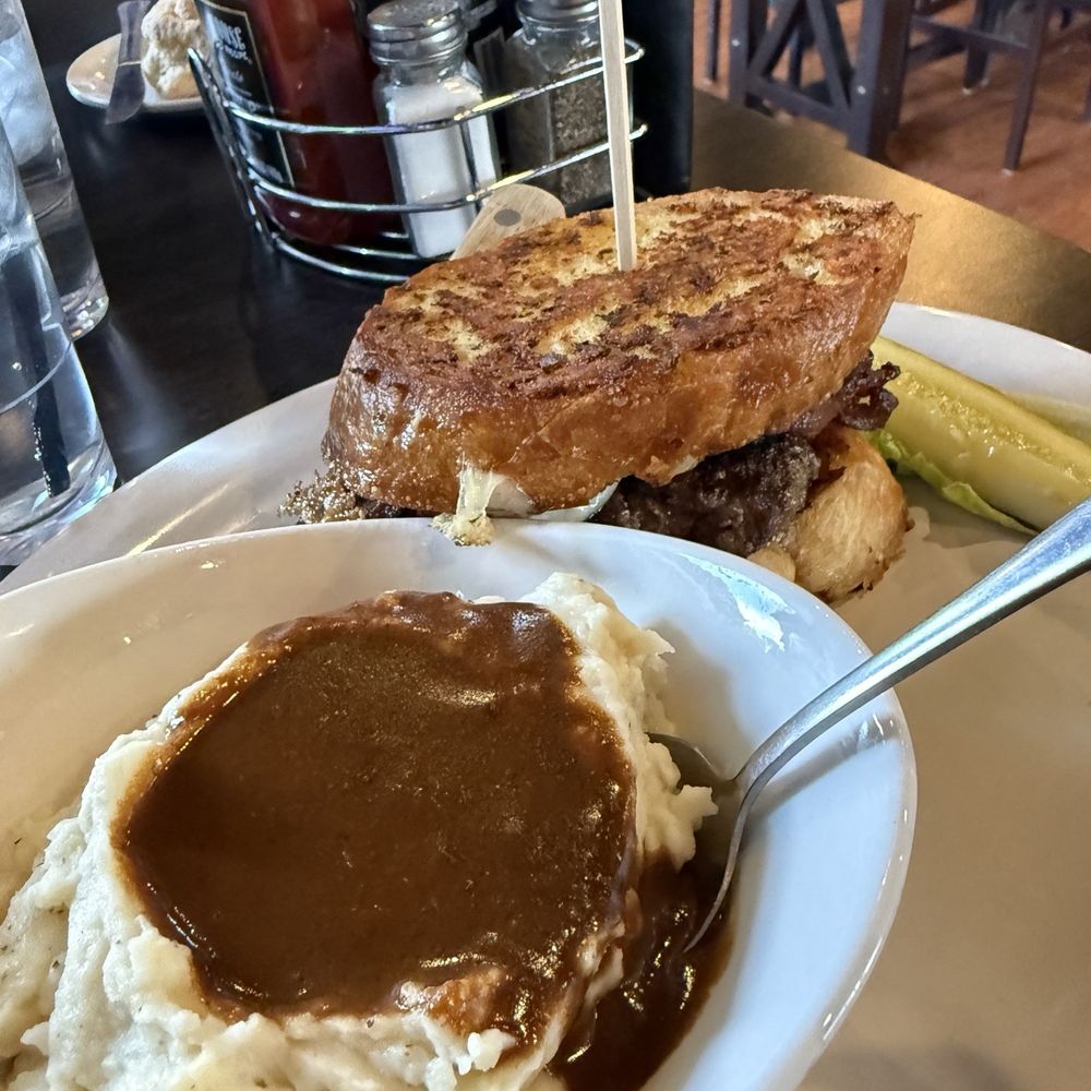 Collins Irish Pub & Grill - Parmesan Melt with mashed potatoes and gravy - Sports Bars Near Me - Flagstaff, Arizona Collins Irish Pub & Grill - Parmesan Melt with mashed potatoes and gravy - Sports Bars Near Me - Flagstaff, Arizona