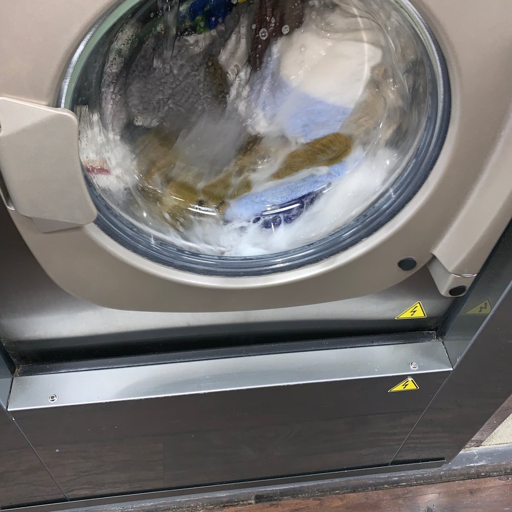 Laundry For Less - Clothes twirling in an inch of water - Laundromat Near Me - Buena Park, California Laundry For Less - Clothes twirling in an inch of water - Laundromat Near Me - Buena Park, California
