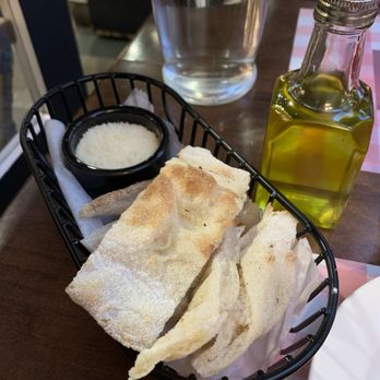 Joanne Trattoria - Bread appetizer with olive oil - Italian Near Me - New York, New York Joanne Trattoria - Bread appetizer with olive oil - Italian Near Me - New York, New York
