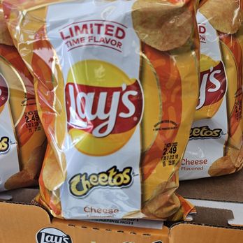 Wawa - a stack of chips on display in a store - Gas Stations Near Me - Orlando, Florida