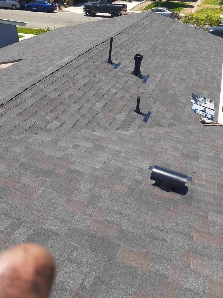 Slide of TopCal Roofing