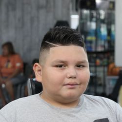 Against The Grain Barber and Beauty Shop - A bald face with hard part ... and sheared top