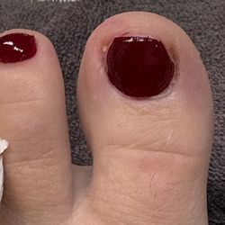 YOLO NAILS - The tech, who I've never seen before did not introduce herself and literally cut the corners of my big toenails.