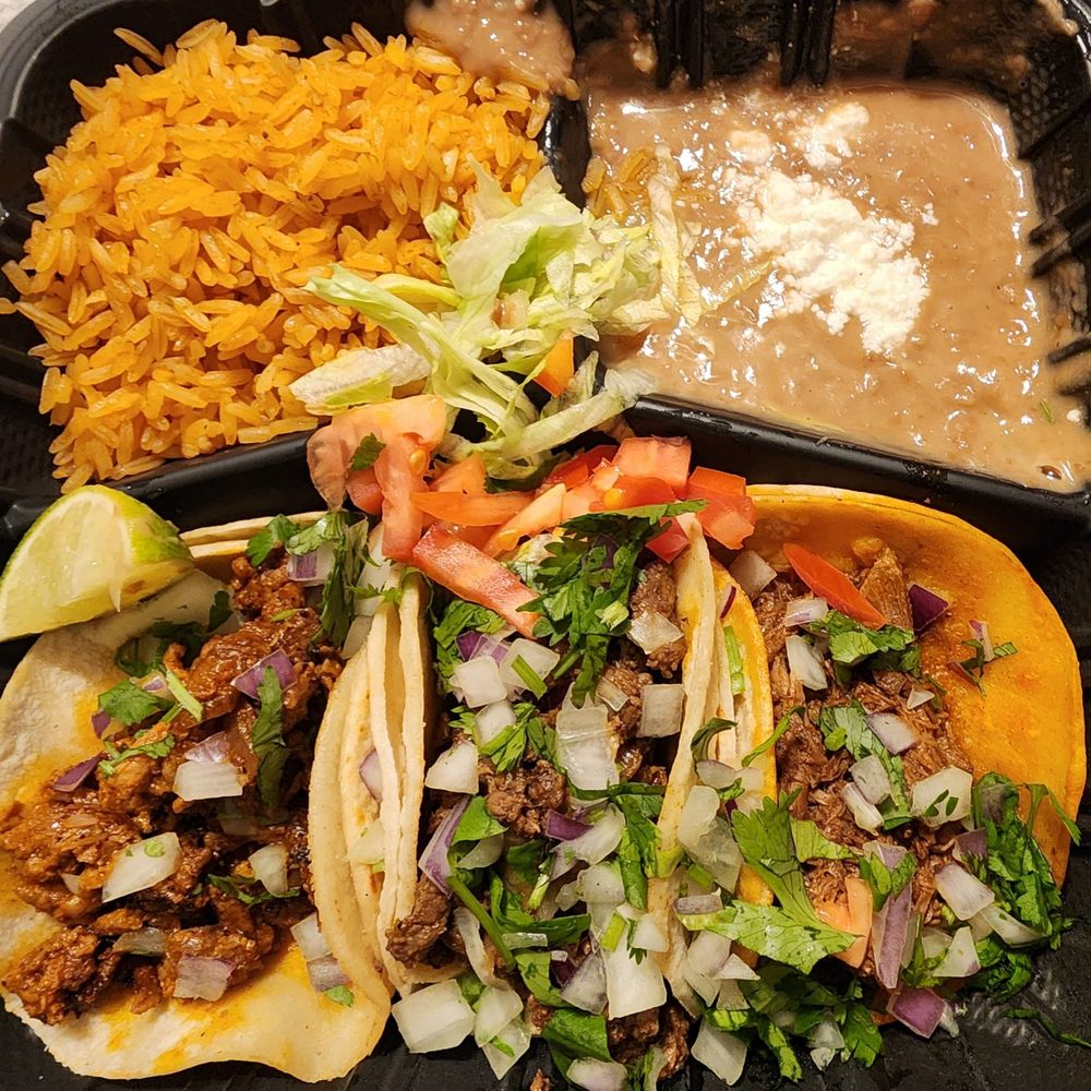Street tacos (pastor, carne asada, and birria), rice, and beans. Street tacos (pastor, carne asada, and birria), rice, and beans.