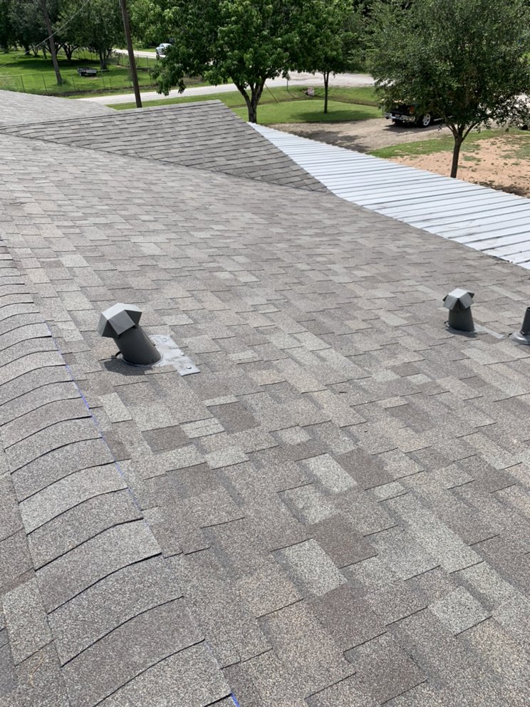 Slide of White Star Roofing